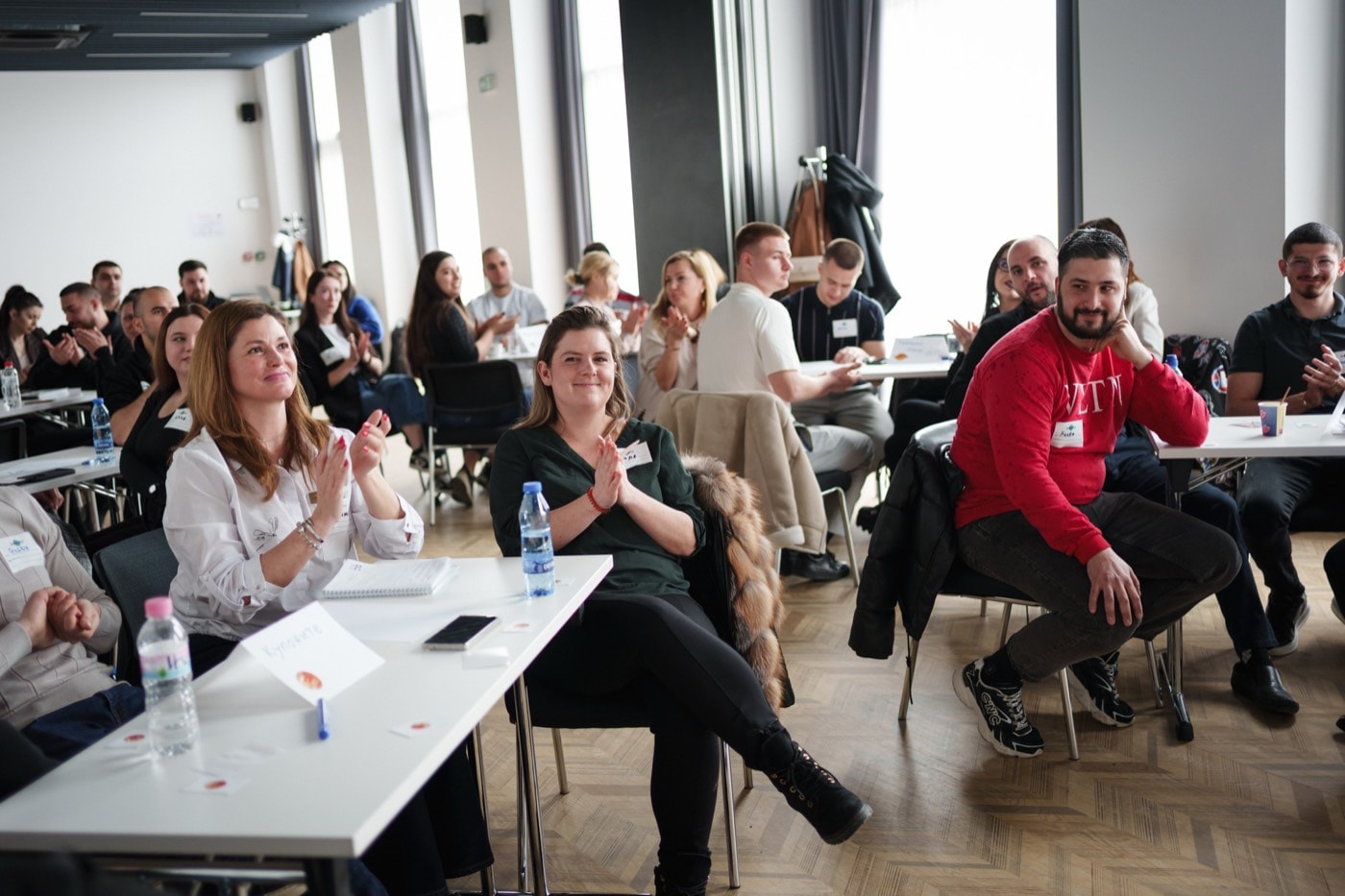 Participants applauding during a live session